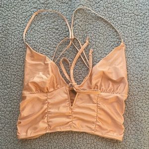 Urban Outfitters out from under crop top